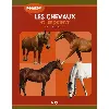 livre regarde les chevaux et les poneys
