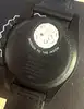 swatch x omega mission to the moonphase snoopy black