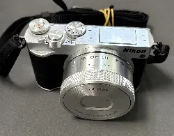 appareil photo hybride nikon 1 j5 silver + objectif nikkor 10-30 mm f/3.5-5.6 vr pdz