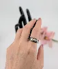 bague jeell en céramique noir centrée d'un motif en or blanc pavé de petits diamants or 750 millième (18 ct) 4,93g