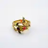 bague les néréides en forme de serpent et fleurs avec pierres orange et rouge
