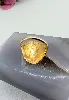 bague ornée d'une imitation de piece 20 francs marianne et coq 1910 or 750 millième (18 ct) 8,29g