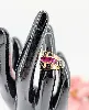 bague tank sertie un diamants d'environ 0,10ct et une ligne de ornée de rubis synthétiques taille baguettes or 750 millième (18 ct