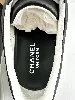 baskets / chaussures tennis chanel en cuir noir avec logo modèle uniform t46