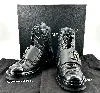 bottes chanel à lacet logo cc en cuir noir mat et verni