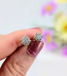 boucle d'oreilles puces chacune ornée de 7 petits diamants d'environ 0,28ct au total or 750 millième (18 ct) 1,61g