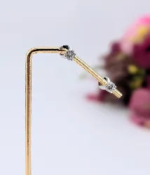 boucles d'oreilles puces chacune ornée d'un diamant d'environ 0,50ct or 750 millième (18 ct) 2,04g