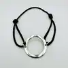 bracelet cordon en cuir marron avec une breloque cercle en argent argent autre 3,73g