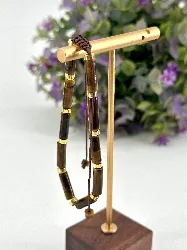 bracelet en métal doré et pierre oeil de tigre