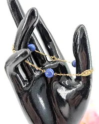 bracelet maille cheval orné de 3 boules de lapis-lazuli  or 750 millième (18 ct) 3,99g