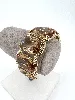 bracelet manchette swarovski harmonia doré orné de cristaux oversize taille coussin