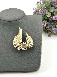 broche ailes ornées d'oxydes en métal doré