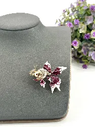 broche en émail poisson violet avec d'oxydes