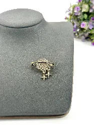 broche en forme d’saturne pavée d'stress en métal doré
