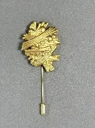 broche galeries lafayette dorée