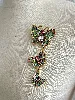 broche pavée d'oxydes en motif trois papillons en métal doré t5 x 13 cm