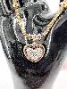 collier orné d'un pendentif coeur en 2 ors pavé de petits diamants d'environ 0,69ct au total or 750 millième (18 ct) 10,85g