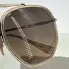 lunettes de soleil ray-ban rb3648-m the marshal ii monture en métal doré et verres morron dégradé