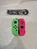 paire de joycon nintendo switch vert + fushia
