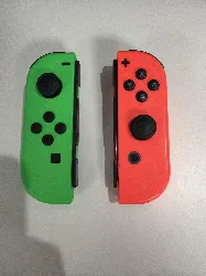 paire de joycon officiel nintendo vert et rouge