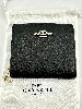 portefeuille coach à bouton pression en cuir noir