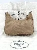 sac à chaîne prada re-édition 2005 en toile beige avec bandoulière et porte monnaie