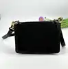 sac bandoulière sonia rykiel en cuir et tissu noir