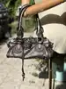 sac chloé paddington en cuir couleur métallisé bronze avec détails argentés