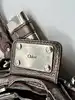 sac chloé paddington en cuir couleur métallisé bronze avec détails argentés