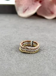 11466 bague triples anneaux pavées d'oxydes en 3 tons argenté, doré, rosé argent 925 millième (22 ct) 4,9g