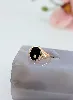 bague chevalière onyx sertie d'un diamant d'environ 0,02cts or 750 millième (18 ct) 4,94g