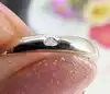 bague marquise centrée d'un saphir synthétique d'environ 2,5ct entouré des quartz blancs or 375 millième (9 ct) 3,75g