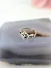 bague rubans croisés en or blanc sertie de petits diamants noirs et blancs or 585 millième (14 ct) 1,28g