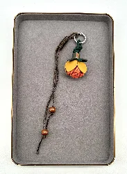 bijoux de sac fleur orange et jaune