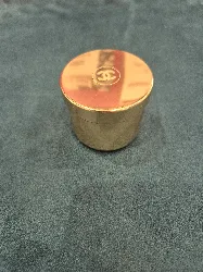 boite de crème vide dorée chanel sublimage