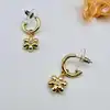boucles d'oreilles maje demi créoles fleurs dorées