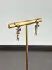 boucles d'oreilles pendantes pavé d'oxydes