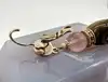 boucles d'oreilles pendantes satellite paris en métal doré, oeil de tigre et quartz rose