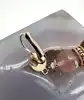 boucles d'oreilles pendantes satellite paris en métal doré, oeil de tigre et quartz rose