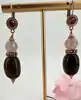 boucles d'oreilles pendantes satellite paris en métal doré, oeil de tigre et quartz rose