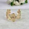 bracelet jonc motif fleur pavé d'oxydes en acier doré