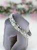 bracelet ligne articulé en or blanc serti de 33 diamants d'environ 4ct au total or 750 millième (18 ct) 23,90g