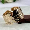 bracelet / manchette motif feuille en acier doré