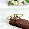 bracelet / manchette motif fleur en acier doré