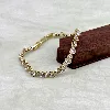 bracelet rivière serti d'oxydes en acier doré l16 /19 cm
