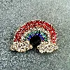 broche motif arc en ciel pavée d'oxydes