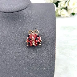 broche motif coccinelle pavée d'oxydes