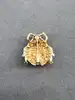 broche motif coccinelle pavée d'oxydes
