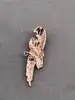 broche perroquet pavé d'oxydes