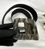 ceinture vintage yves saint laurent rive gauche en cuir verni pailleté bronze olive avec boucle carrée au motif écaille